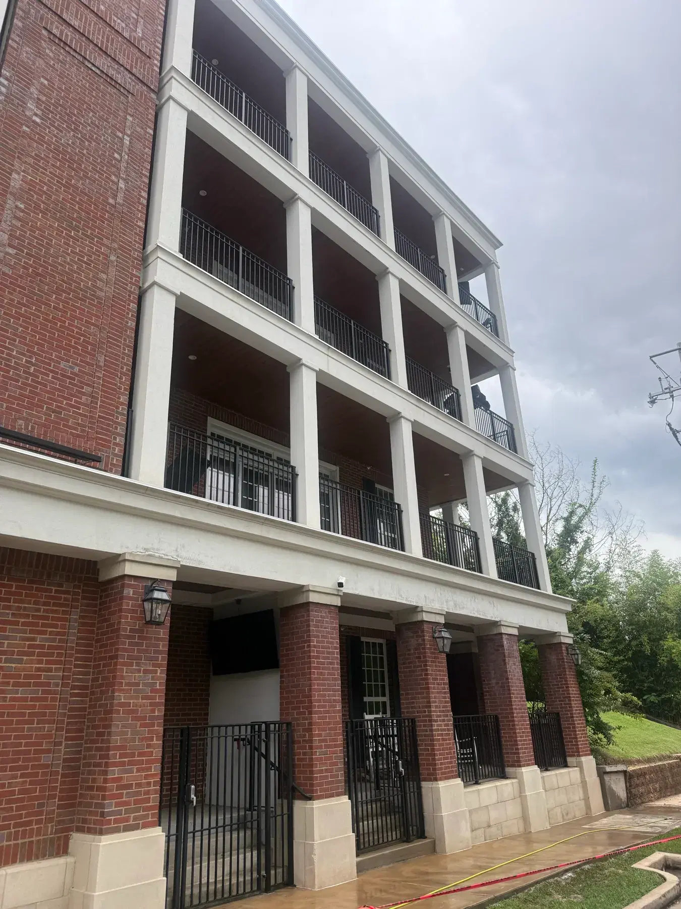 Clean multi story building exterior after professional maintenance