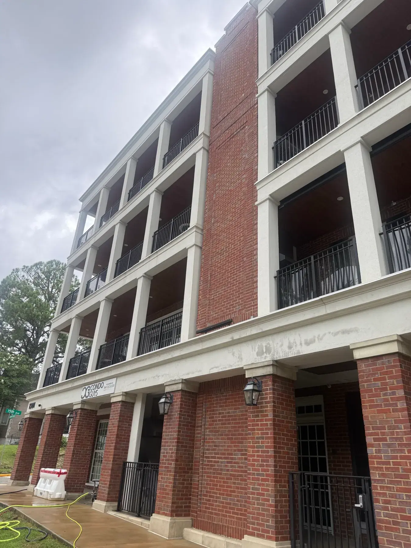Commercial pressure washing at a multi story condominium complex