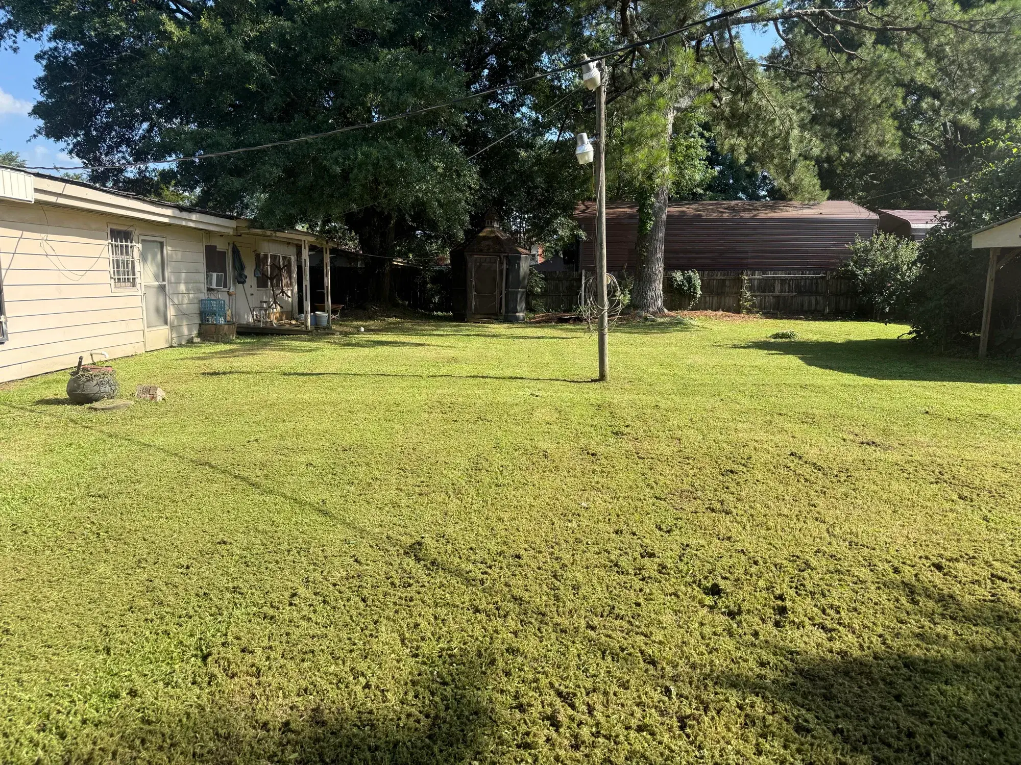 Clean residential backyard after landscaping and lawn maintenance